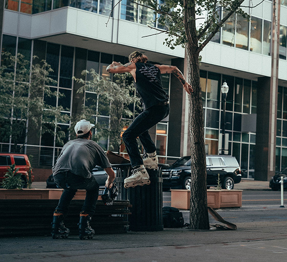 Rollerblader does street grind