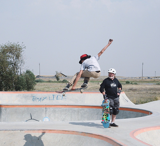 Skateboarder does melon grab