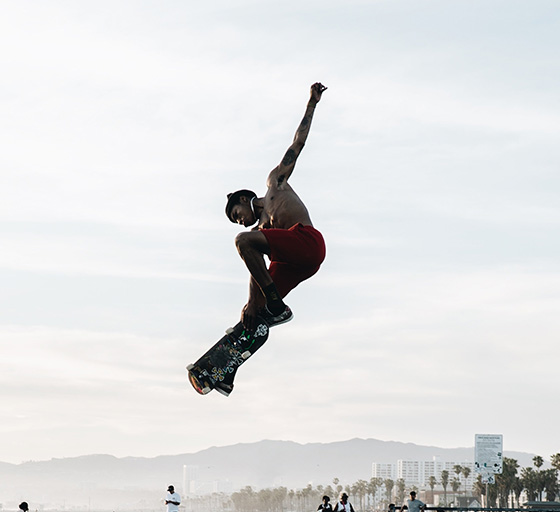 Skateboarder doing a tuck knee